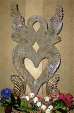 Eyes4ice -  Love Birds On A Heart Ice Sculpture (LBH-01) for a wedding reception centerpiece.