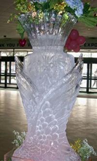 Eyes4ice - Wing-wrapped Vase Ice Sculpture (WV-01) for a welcoming centerpiece to a grand dinner reception.